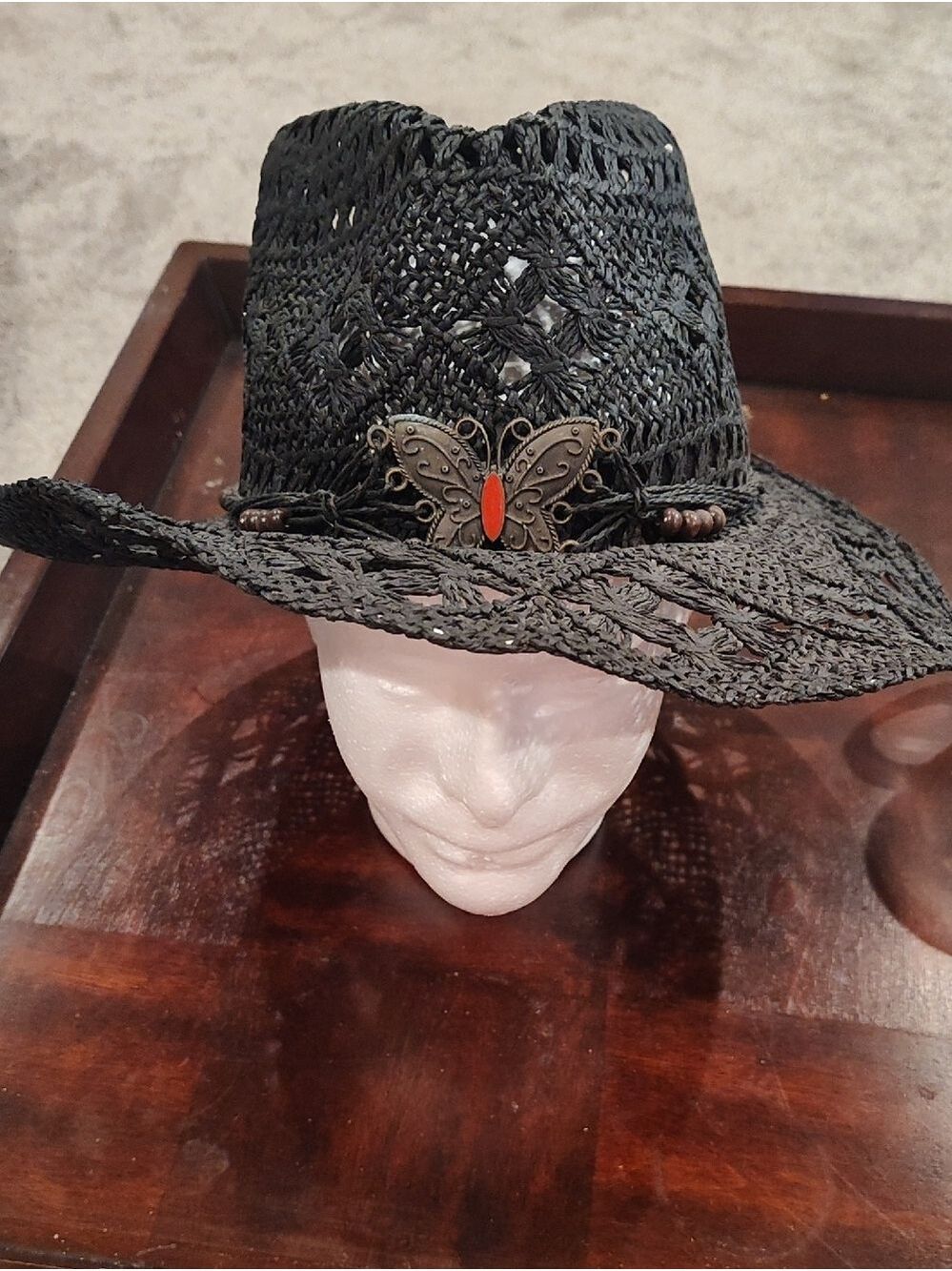 Black Woven Straw Cowgirl Hat with Decorative Butterfly Accent